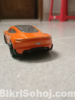 Hotwheels (Tesla Roadster), Matchbox (Tesla Model S)